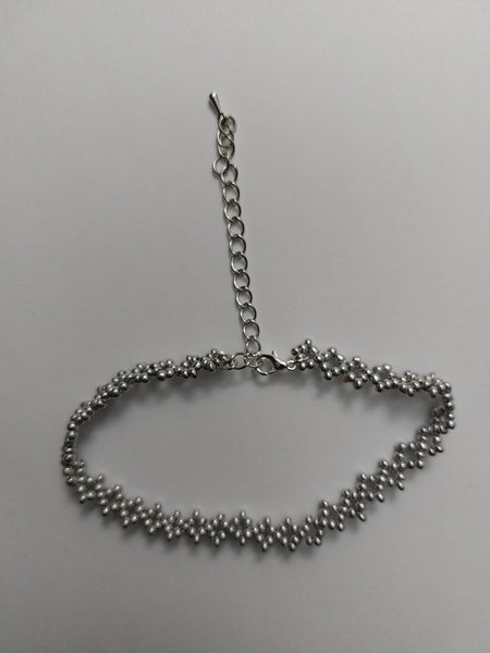 Bracelet: Silver color beaded bracelet