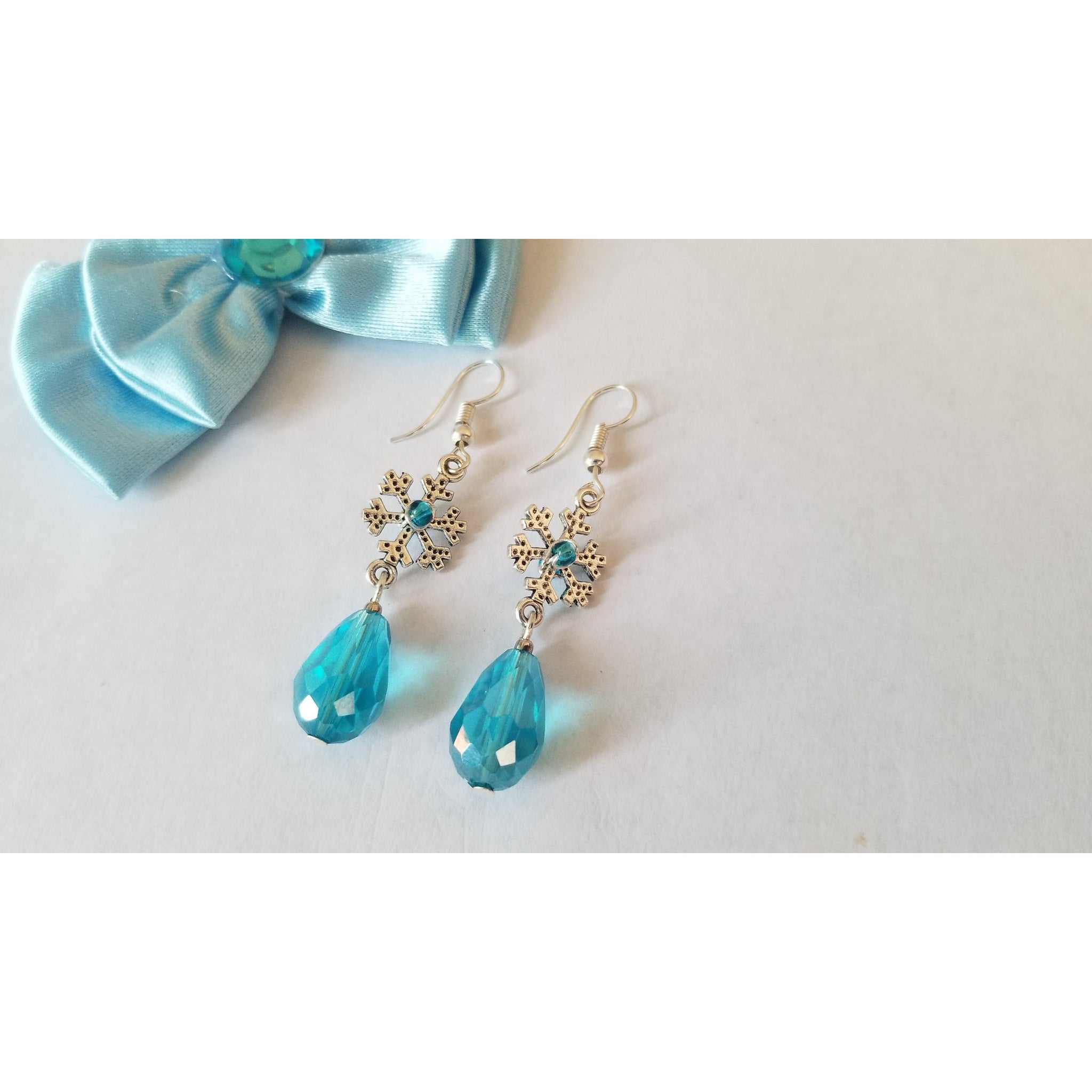 Snowflake Earrings with Blue Dangling